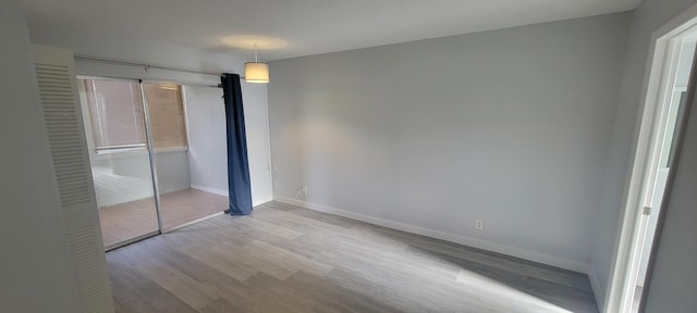 bedroom featuring hardwood / wood-style floors