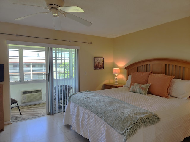 bedroom with access to exterior, ceiling fan, and a wall mounted air conditioner