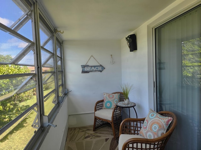 sunroom featuring a wealth of natural light