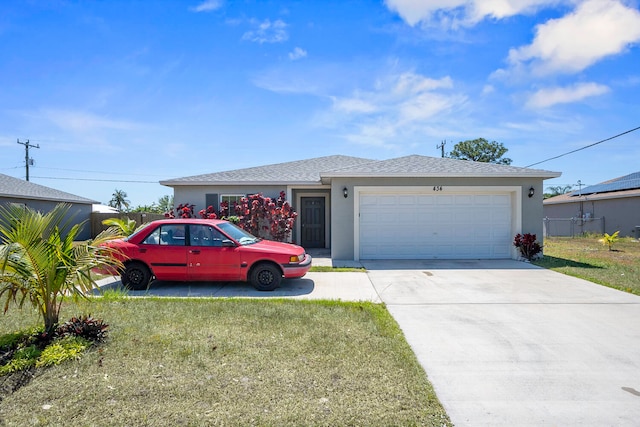 ranch-style home featuring a garage and a front lawn