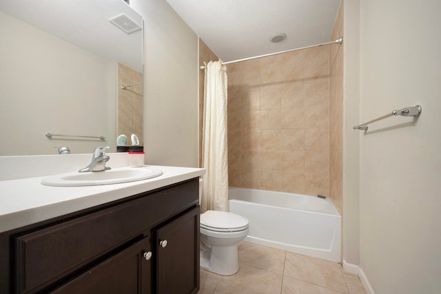 full bathroom with shower / bathtub combination with curtain, toilet, tile flooring, a textured ceiling, and vanity