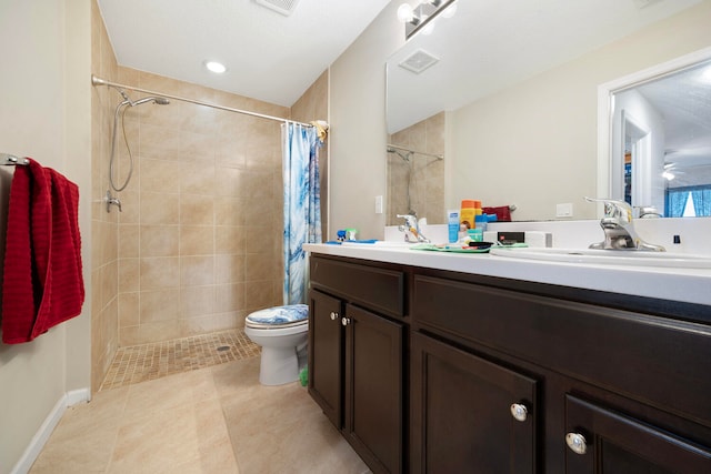 bathroom featuring curtained shower, dual bowl vanity, toilet, and tile flooring