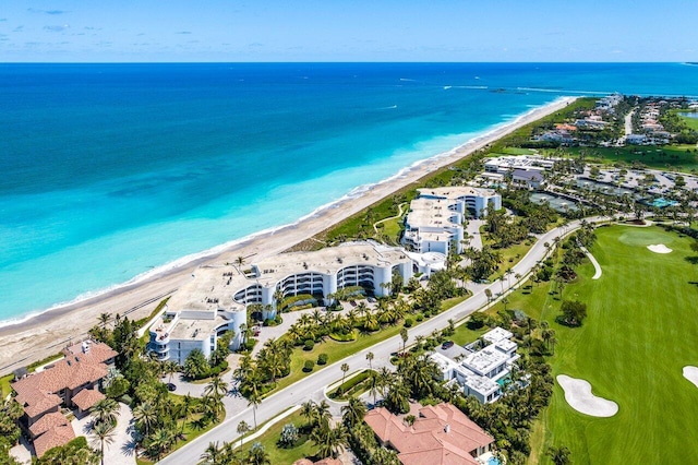 bird's eye view featuring a beach view and a water view