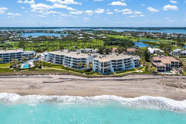 aerial view with a view of the beach and a water view