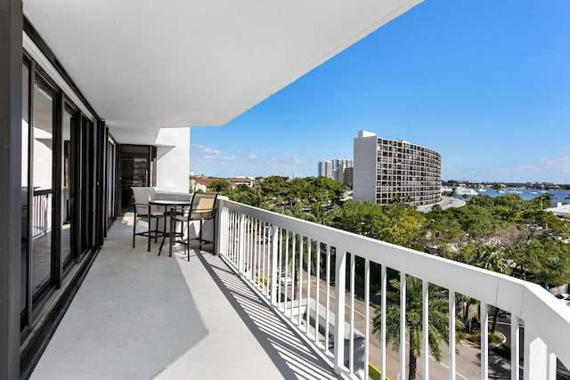 balcony featuring a water view