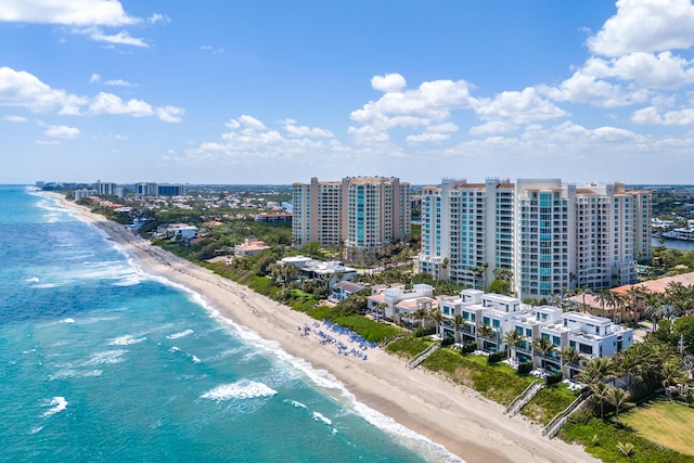 bird's eye view with a beach view and a water view