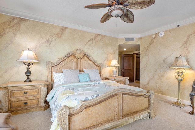 carpeted bedroom featuring ceiling fan and crown molding