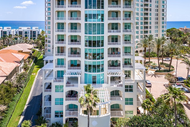 view of building exterior with a water view