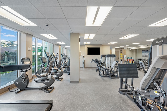 exercise room with a drop ceiling