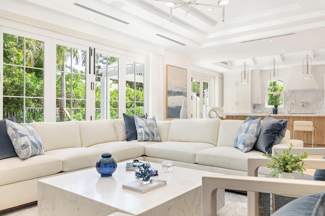 sunroom with a tray ceiling