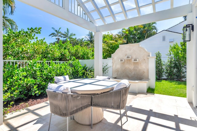 view of patio with a hot tub