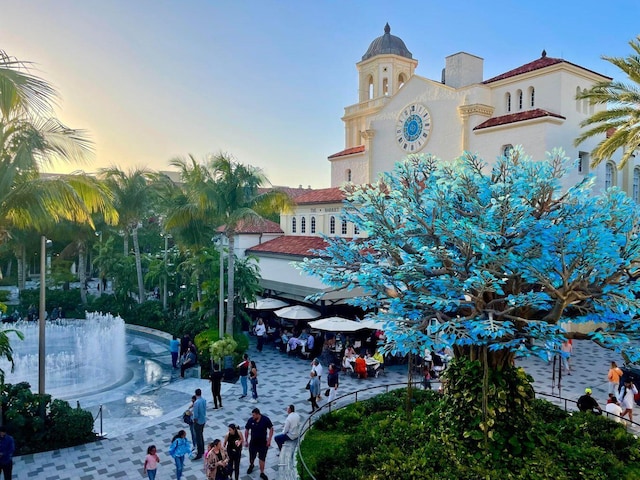 view of outdoor building at dusk