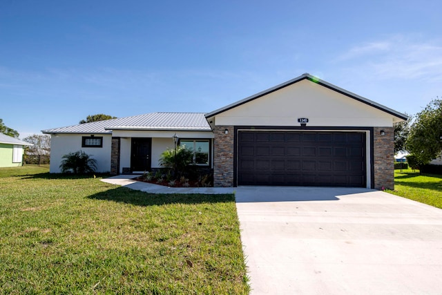 ranch-style home with a garage and a front lawn