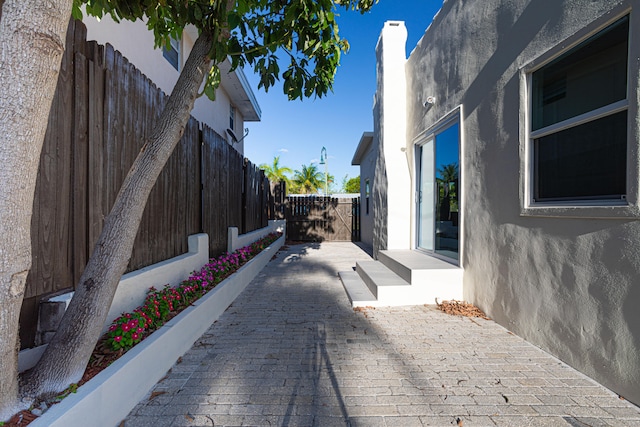 view of property exterior with a patio