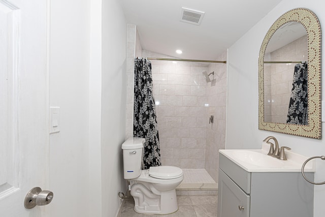 bathroom with walk in shower, oversized vanity, toilet, and tile floors