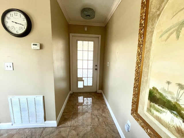 doorway to outside with ornamental molding and light tile flooring