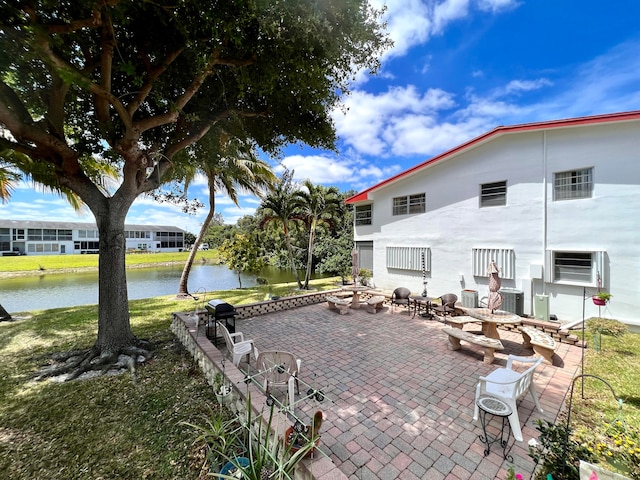 view of patio / terrace featuring a water view