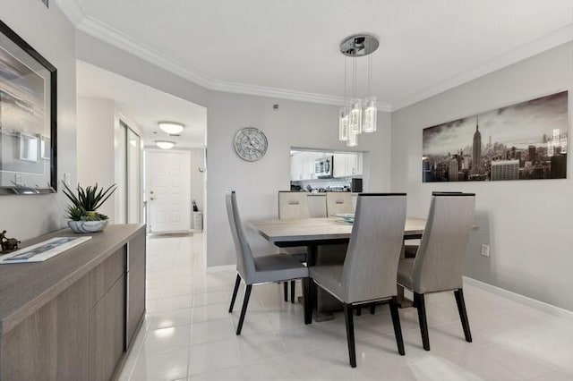 dining space with ornamental molding and light tile floors