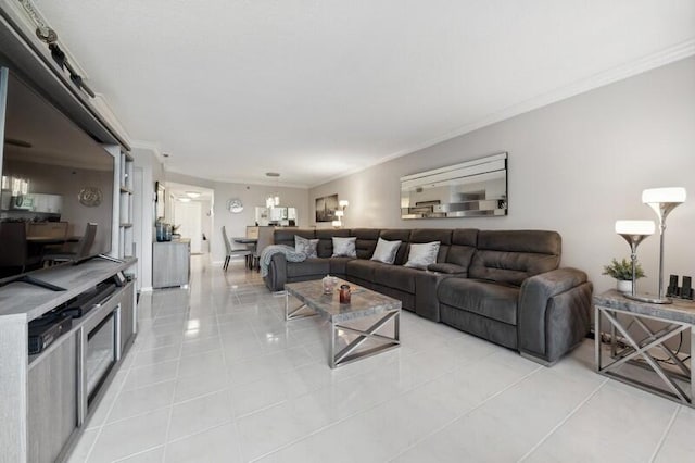 living room with ornamental molding and light tile floors