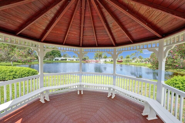 exterior space featuring a gazebo and a water view