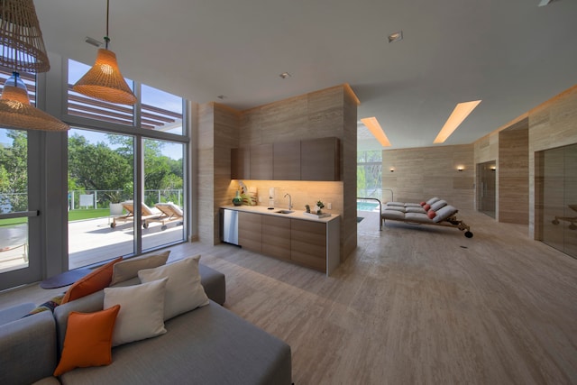 interior space featuring tile walls and sink