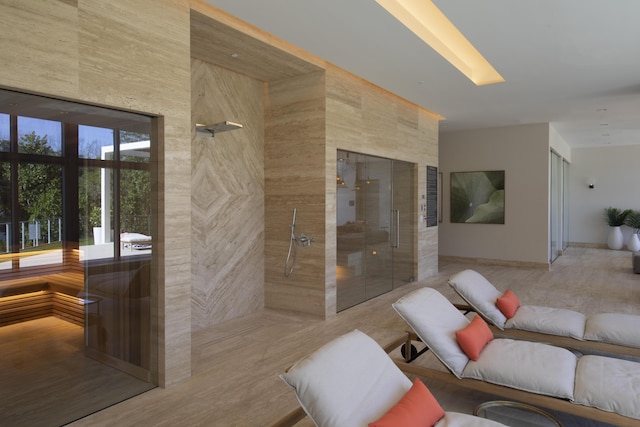 interior space featuring a tile shower