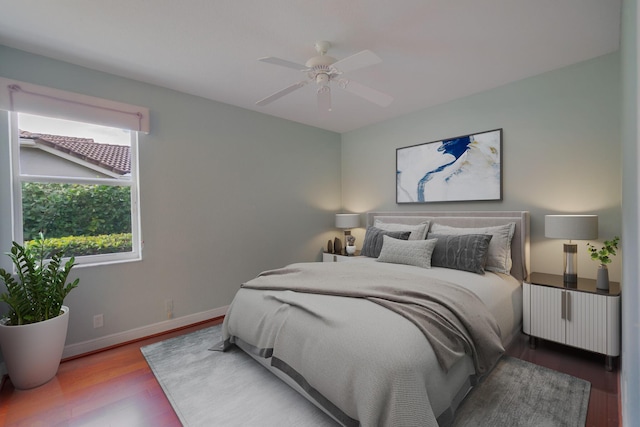 bedroom featuring ceiling fan and wood-type flooring