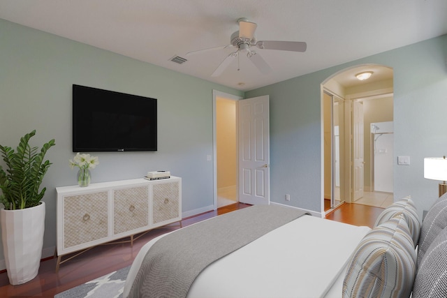 bedroom featuring hardwood / wood-style floors and ceiling fan