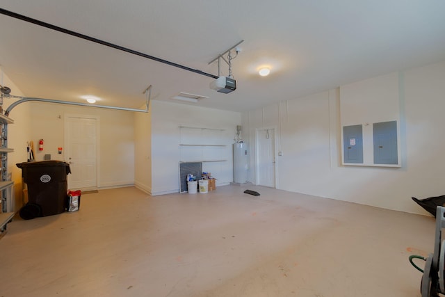 garage featuring a garage door opener, electric panel, and water heater