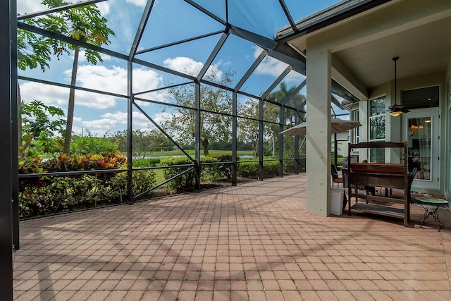 view of patio / terrace with glass enclosure