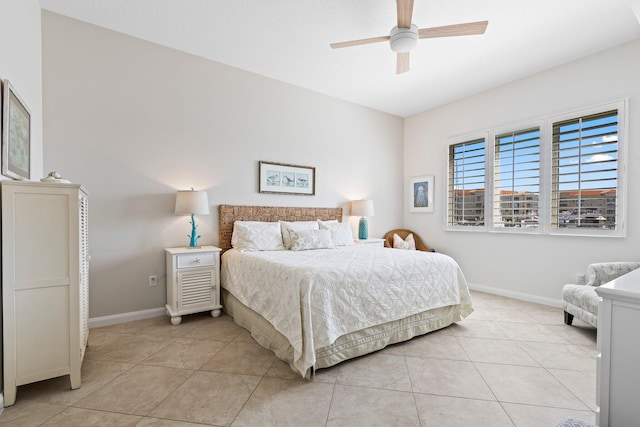 bedroom featuring light tile patterned floors and ceiling fan