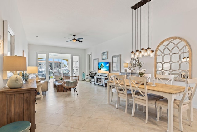 dining room featuring ceiling fan and light tile patterned floors