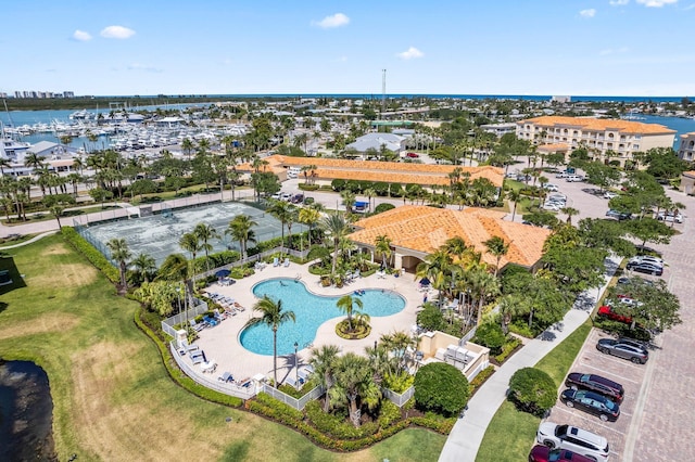 drone / aerial view with a water view