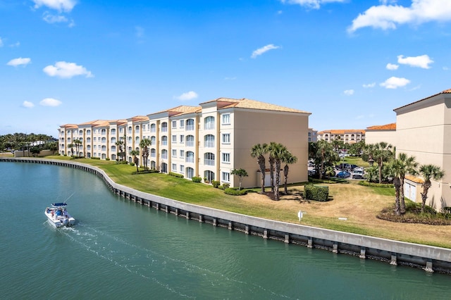 exterior space with a water view