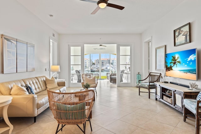 tiled living room featuring ceiling fan