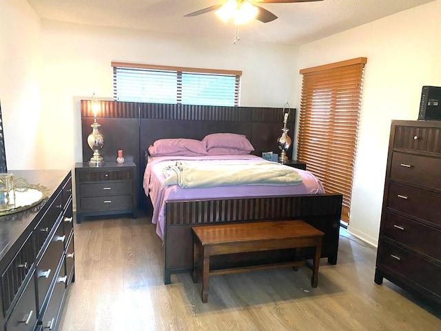 15451 Pembridge Dr Unit 217, Delray Beach, FL 33484 - bedroom with light wood-style flooring and ceiling fan