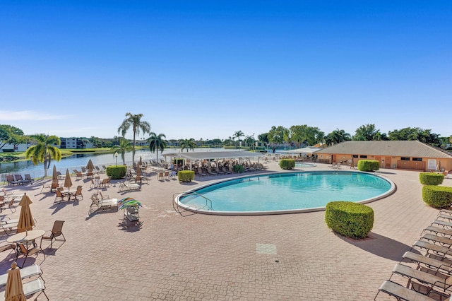 15451 Pembridge Dr Unit 217, Delray Beach, FL 33484 - community pool featuring a water view and a patio area