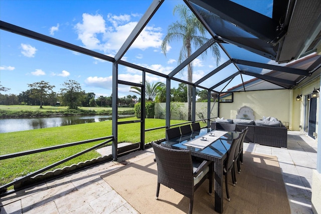 sunroom with a water view