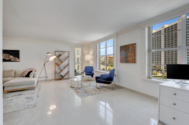 unfurnished room featuring ornamental molding and light tile patterned floors