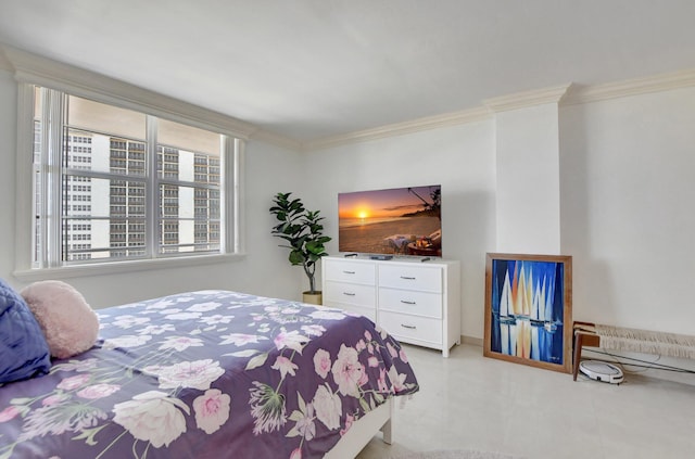 bedroom featuring crown molding