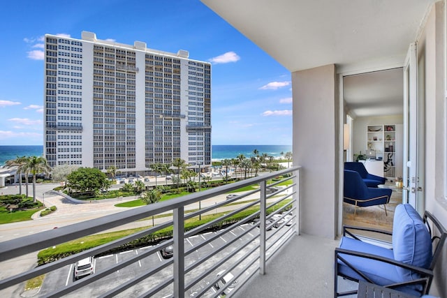 balcony featuring a water view