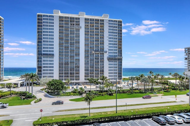 view of building exterior with a water view