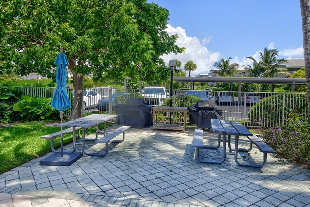 view of patio with a grill