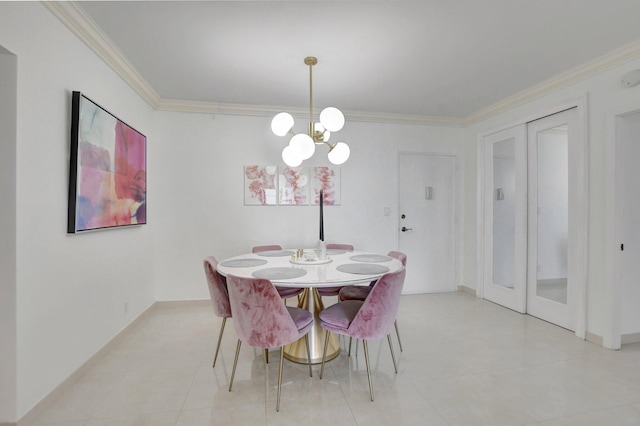 dining area featuring crown molding and a chandelier