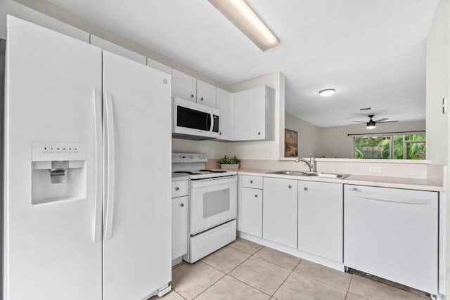 kitchen featuring sink, white appliances, light tile patterned floors, ceiling fan, and white cabinets