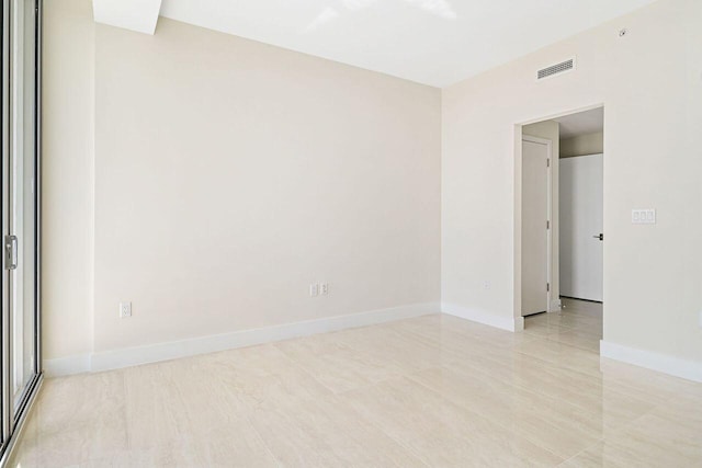 view of tiled empty room