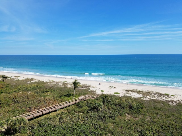 property view of water featuring a beach view