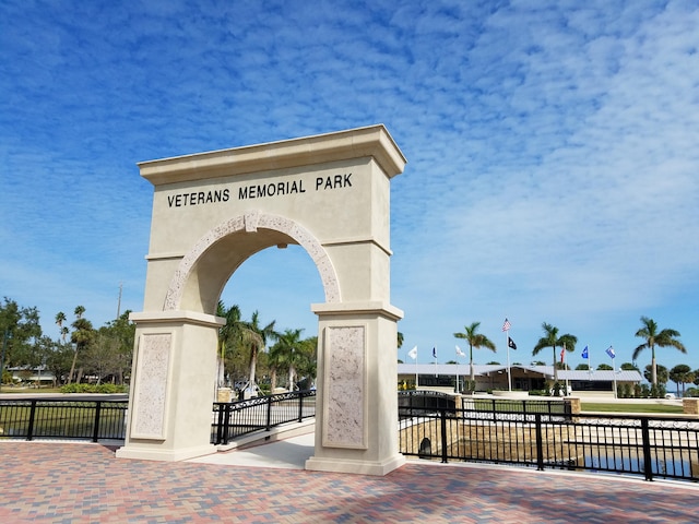 surrounding community with a gate and fence