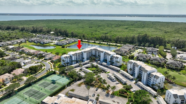 birds eye view of property featuring a water view