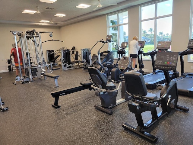 gym featuring a paneled ceiling